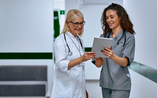 doctor-and-nurse-looking-at-ipad